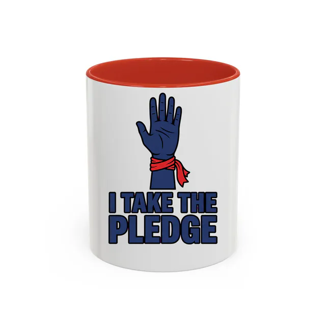 A raised hand with a ribbon on the wrist, I TAKE THE PLEDGE, on a red accent mug