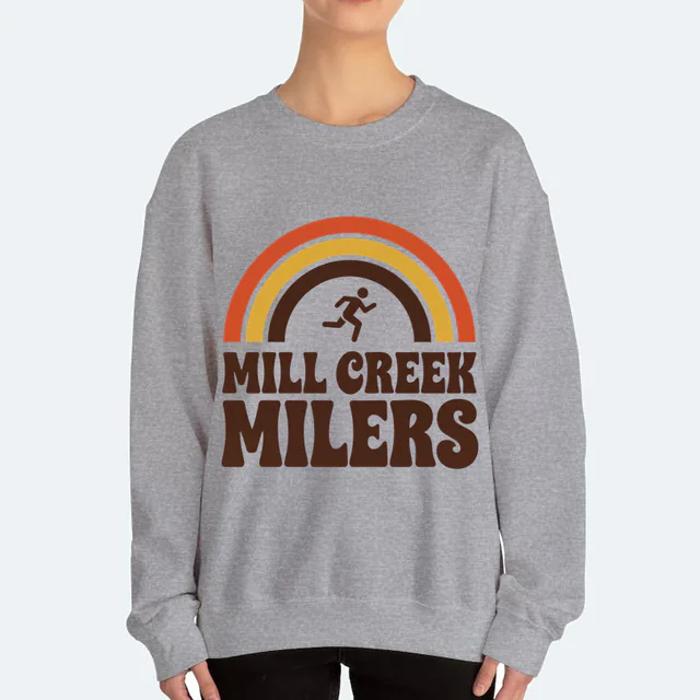 Retro stripes arcing over a runner, MILL CREEK MILERS, on a sport gray adult crewneck