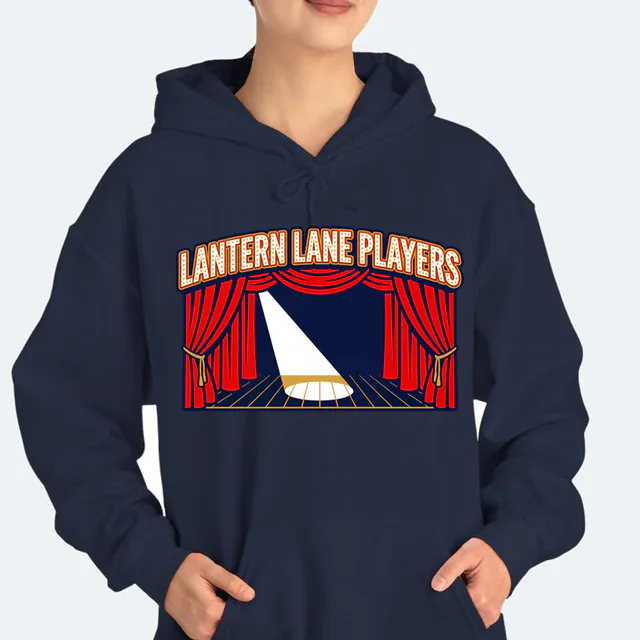 Open stage curtains and a spotlight for the Lantern Lane Players, on a navy adult hoodie