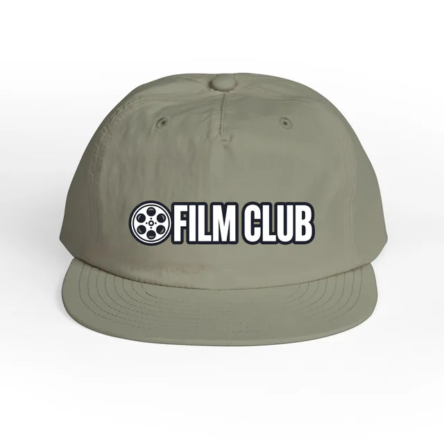 A small film reel beside FILM CLUB, on an eucalyptus surf cap