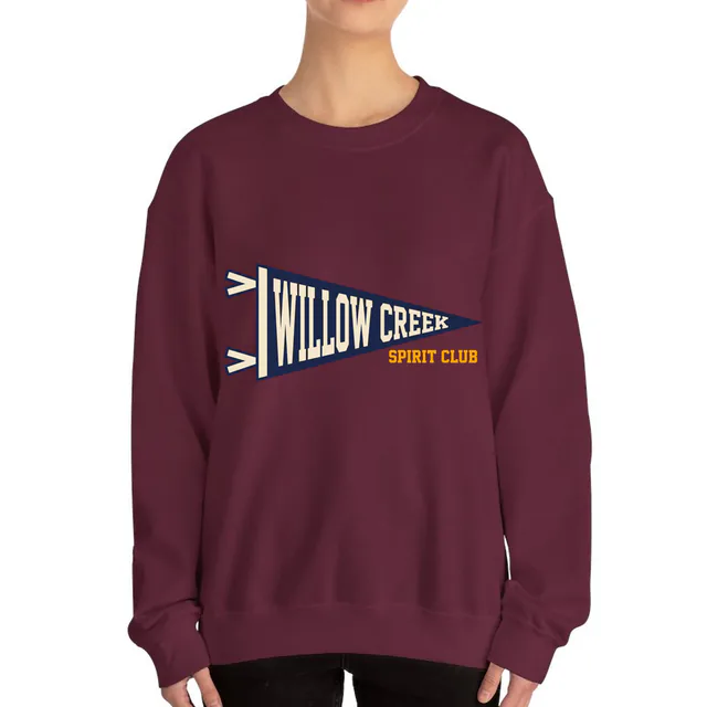 A vintage pennant for the Willow Creek spirit club, on a maroon adult crewneck