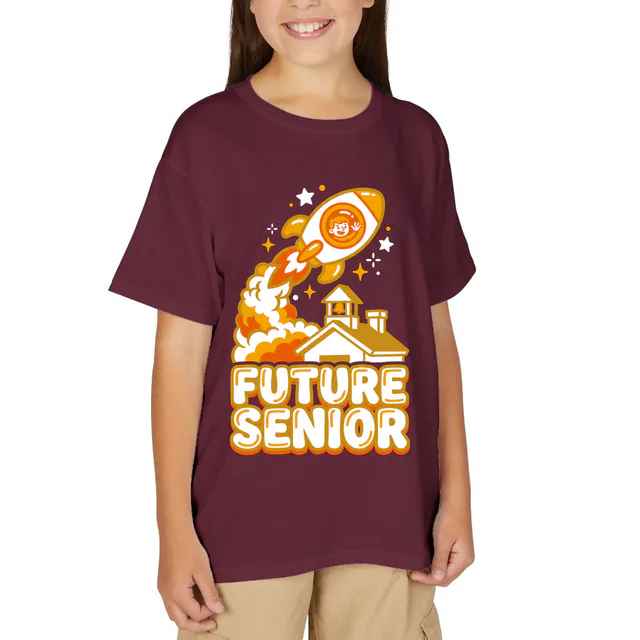 A kid waving from a rocket over the school, FUTURE SENIOR, on a maroon youth t-shirt