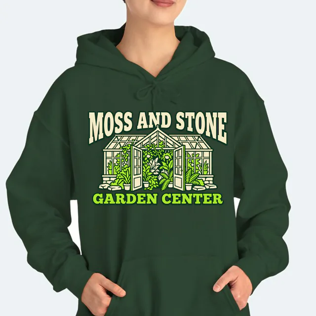 A greenhouse spilling plants, MOSS AND STONE GARDEN CENTER, on a forest green adult hoodie