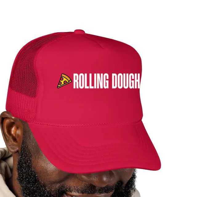 A pizza slice beside ROLLING DOUGH, on a red foam trucker hat
