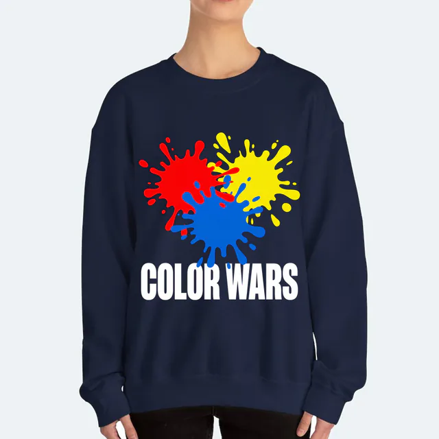 Paint splatters colliding over COLOR WARS, on a navy adult crewneck