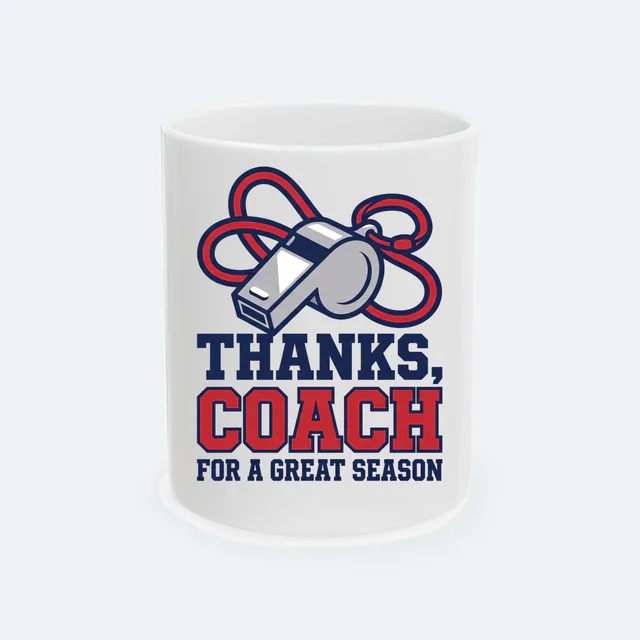 A whistle on a looping lanyard, THANKS, COACH, on a white ceramic mug