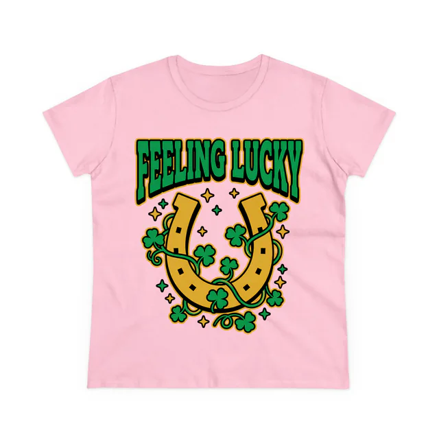 A clover-wrapped horseshoe under FEELING LUCKY, on a light pink women's t-shirt
