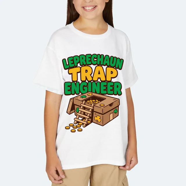 A craft-stick leprechaun trap, LEPRECHAUN TRAP ENGINEER, on a white youth t-shirt