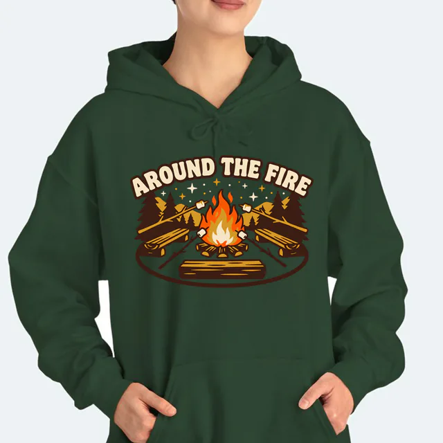 Marshmallows toasting around a campfire under the stars, on a forest green adult hoodie