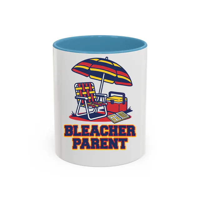 A lawn chair under an umbrella, BLEACHER PARENT, on a light blue accent mug