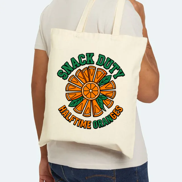 Orange wedges fanned like a sunburst, SNACK DUTY, on a natural canvas tote