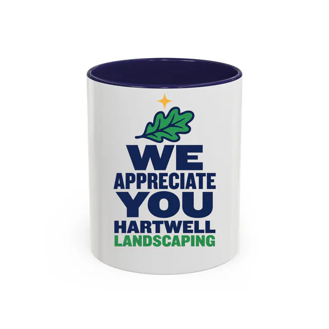 An oak leaf for Hartwell Landscaping, WE APPRECIATE YOU, on a navy accent mug