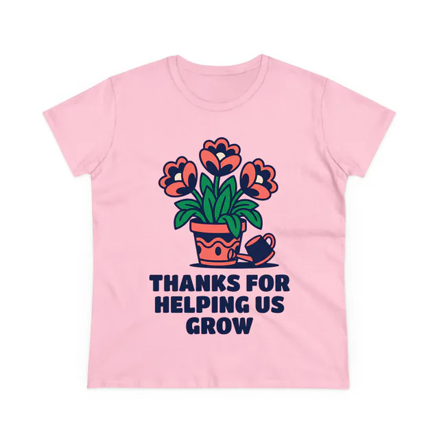 A blooming potted plant, THANKS FOR HELPING US GROW, on a light pink women's t-shirt