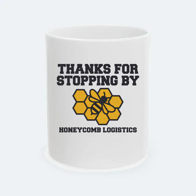 A honeycomb and a bee, THANKS FOR STOPPING BY, on a white ceramic mug