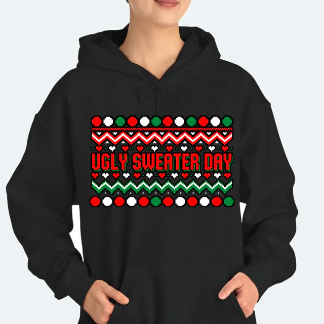 A wide knit band of zigzags and pom-poms, UGLY SWEATER DAY, on a black adult hoodie