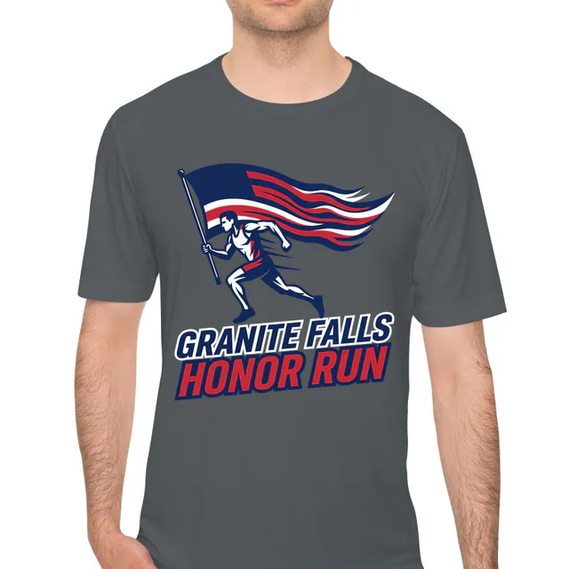 A runner carrying a streaming flag, GRANITE FALLS HONOR RUN, on an iron gray performance tee