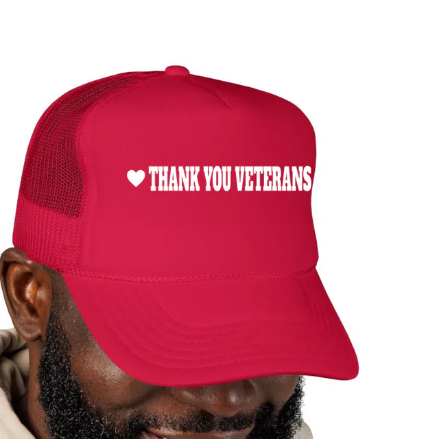 A heart beside THANK YOU VETERANS, on a red foam trucker hat