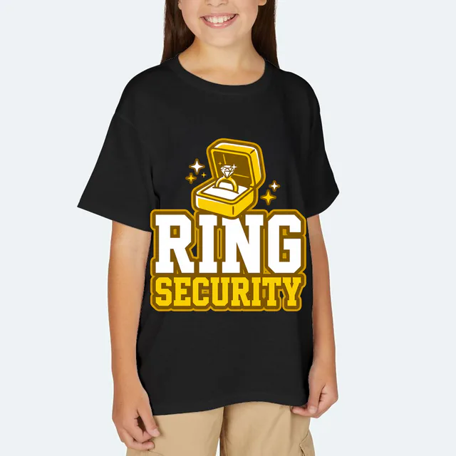 An open ring box, RING SECURITY, on a black youth t-shirt