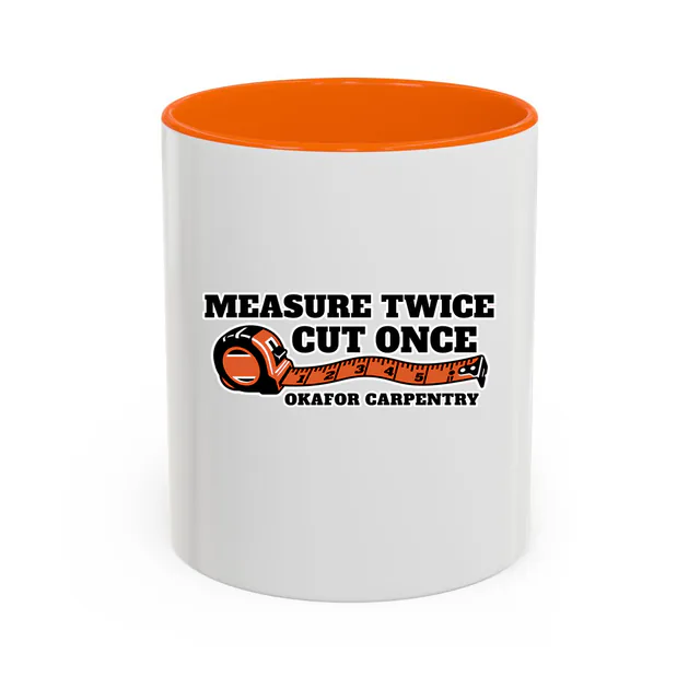 A tape measure under MEASURE TWICE, CUT ONCE, on an orange accent mug