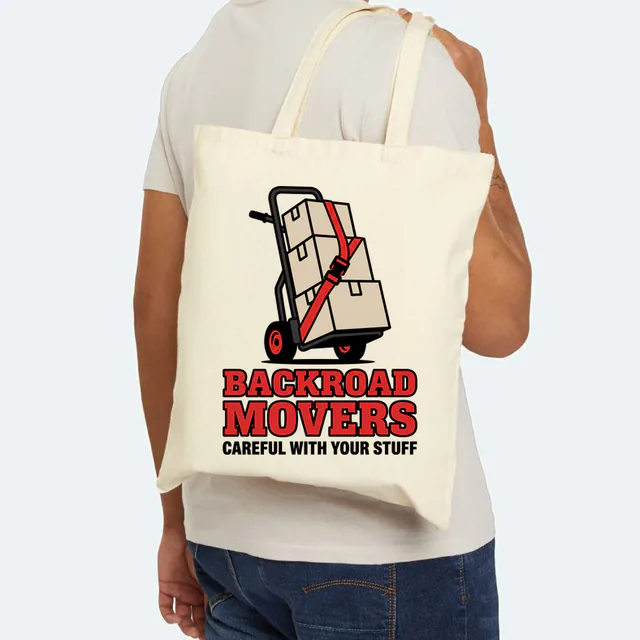 A hand truck of moving boxes, BACKROAD MOVERS, on a natural canvas tote