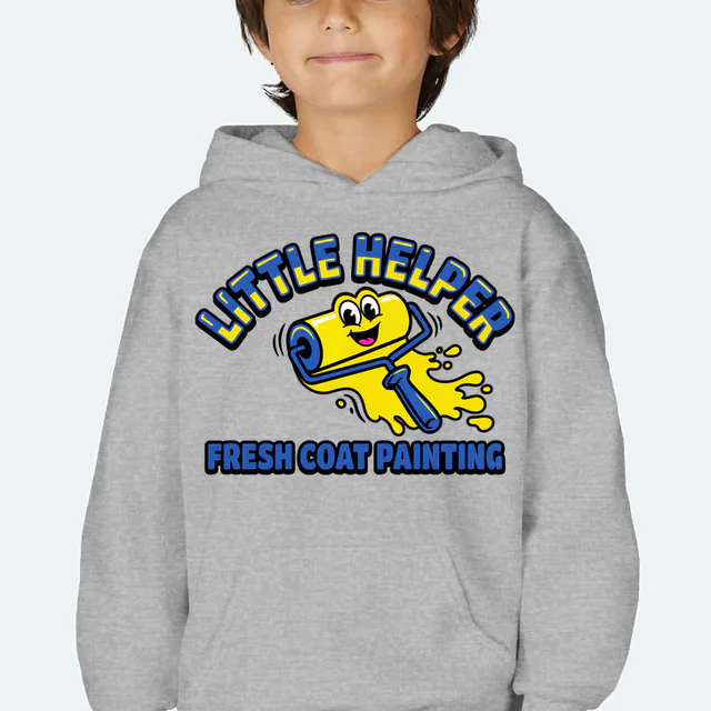 A paint roller rolling a bright stripe, LITTLE HELPER, on a sport gray youth hoodie