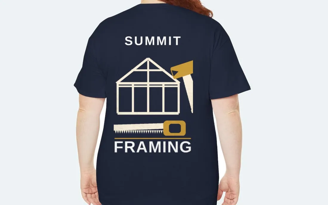 The back of a navy adult t-shirt printed with a Summit Framing logo: a house frame, a hammer, and a saw