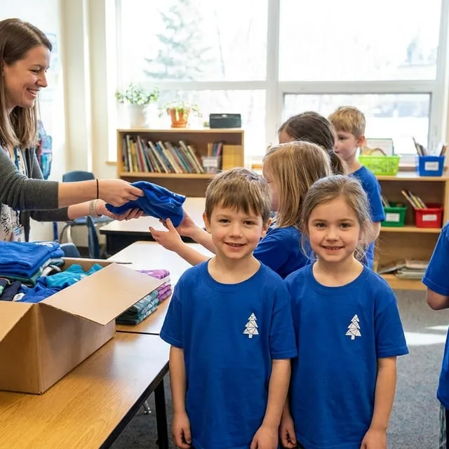 Children in matching school spirit t-shirts