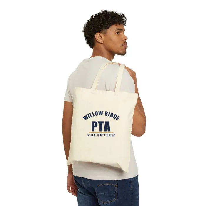 A natural canvas tote printed with an arched Willow Ridge PTA volunteer design