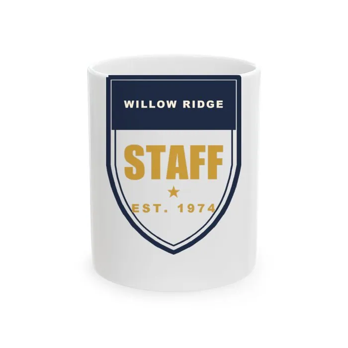 A white ceramic mug printed with a navy Willow Ridge staff crest