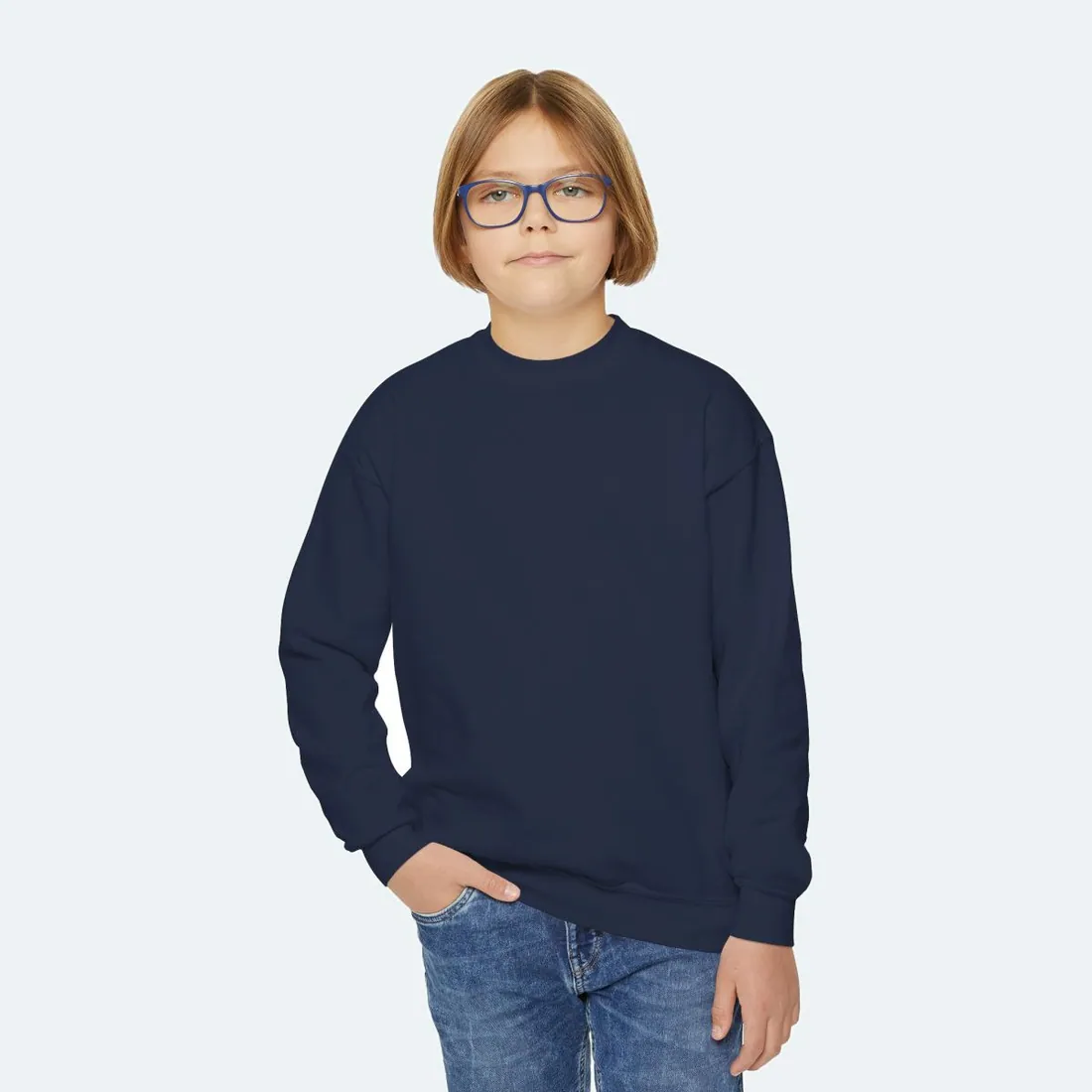 Youth Crewneck in navy, the Gildan 18000B we print on, as worn